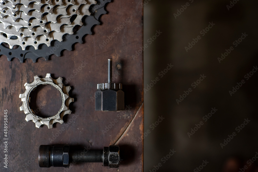 Bicycle tools on the wooden table with negative space for words Bicycle tools on the wooden table with negative space for words