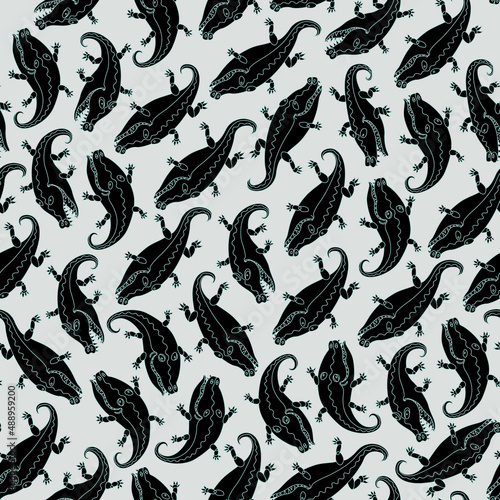 Vector Seamless Paisley pattern of vector ornate Crocodiles. Green contour, Black silhouette on a light gray background