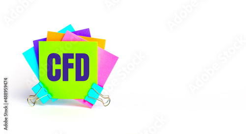 There are bright multi-colored stickers with the text CFD. Copy space photo