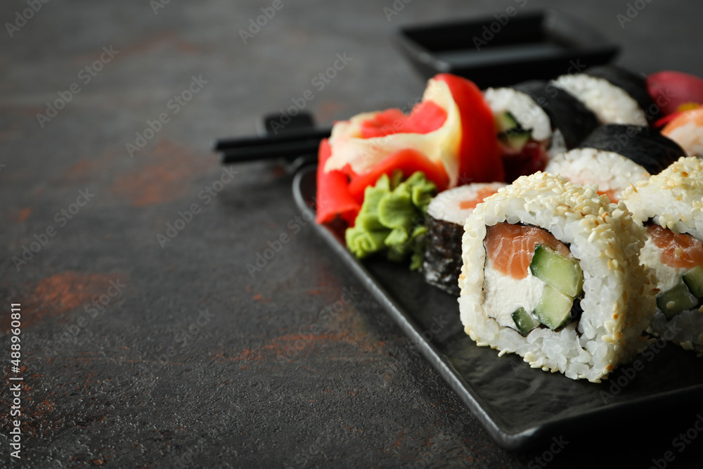 Concept of tasty food with sushi, space for text Concept of tasty food with sushi, space for text