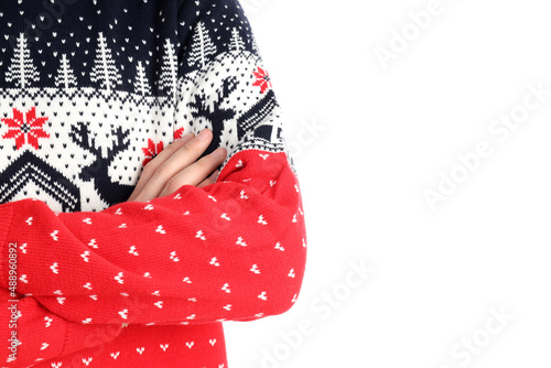 Guy in Christmas sweater isolated on white background © Atlas