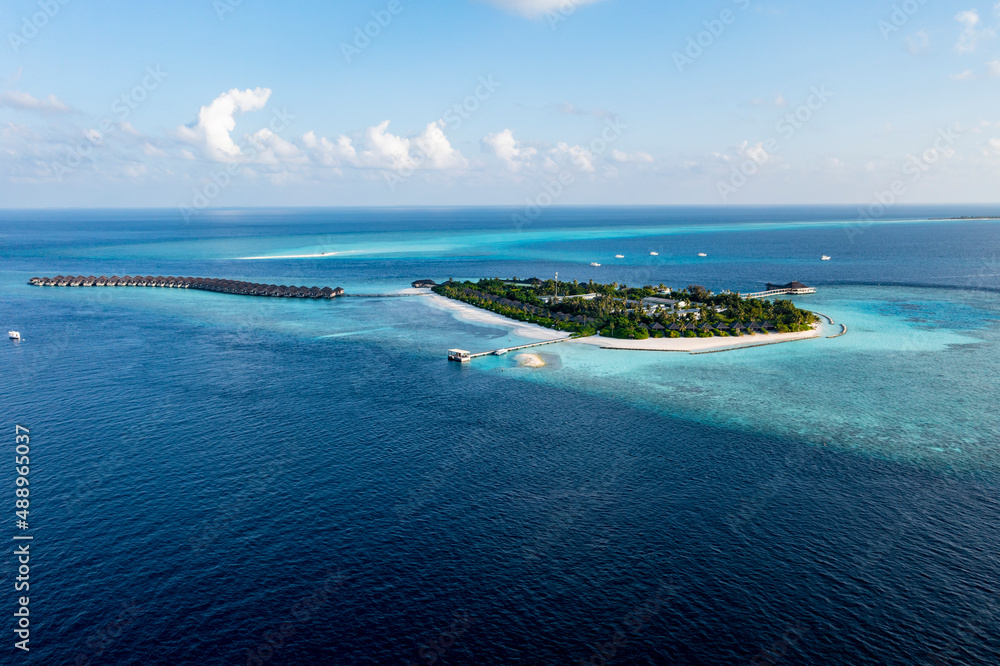 Aerial view, Asia, Indian Ocean, Maldives, Lhaviyani Atoll, Hurawalhi Island resort with beaches and water bungalows