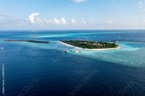 Aerial view, Asia, Indian Ocean, Maldives, Lhaviyani Atoll, Hurawalhi Island resort with beaches and water bungalows