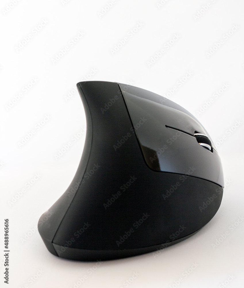 Black vertical mouse isolated on the white background Black vertical mouse isolated on the white background