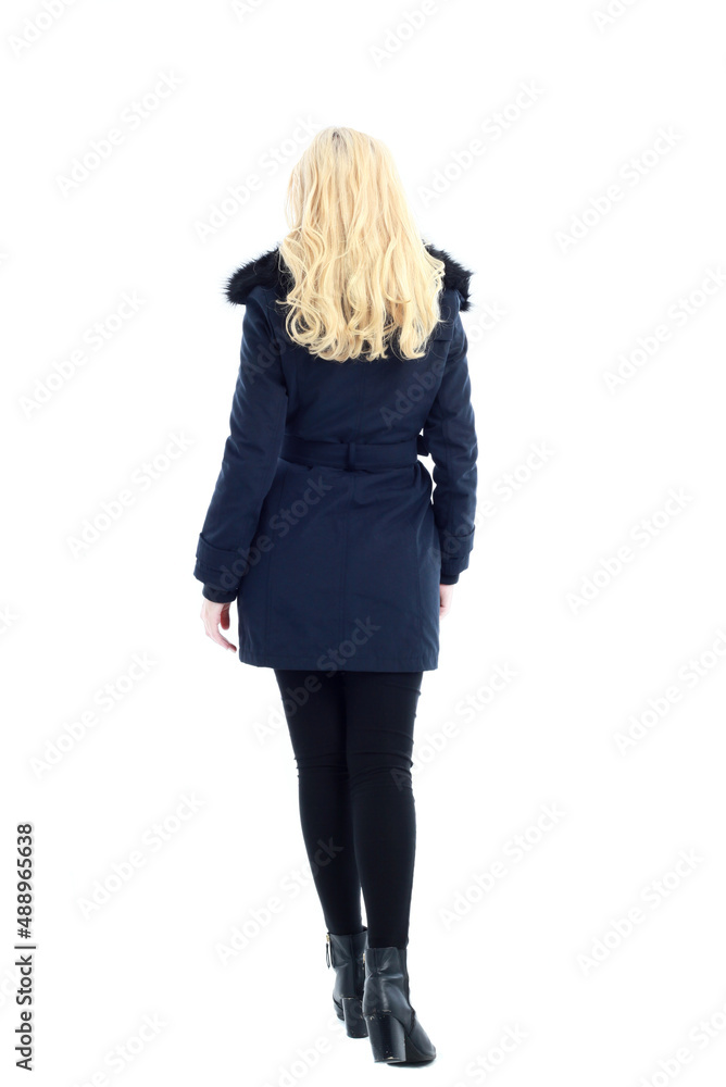 full length portrait of blonde woman wearing long winter coat. and casual clothes. standing pose, isolated on a white studio background. full length portrait of blonde woman wearing long winter coat. and casual clothes. standing pose, isolated on a white studio background.