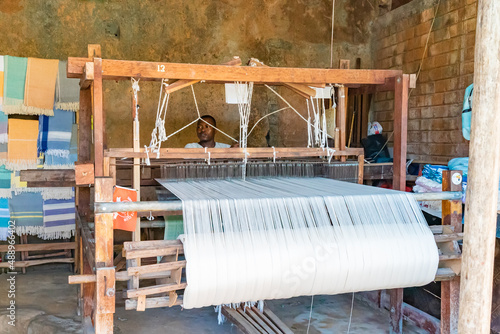 Stone town, Zanzibar, Tanzania December 22, 2021: Loom on the market in old fortress photo