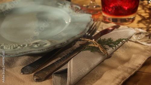 Vintage Ceramic Plate With Silverwares On The Side Placed On Fabric Placemat. Festive Table Setting. close up photo