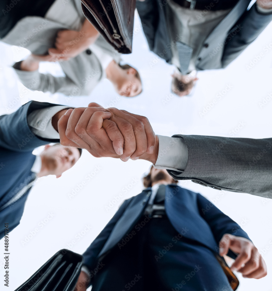 © ASDF - bottom view.business handshake