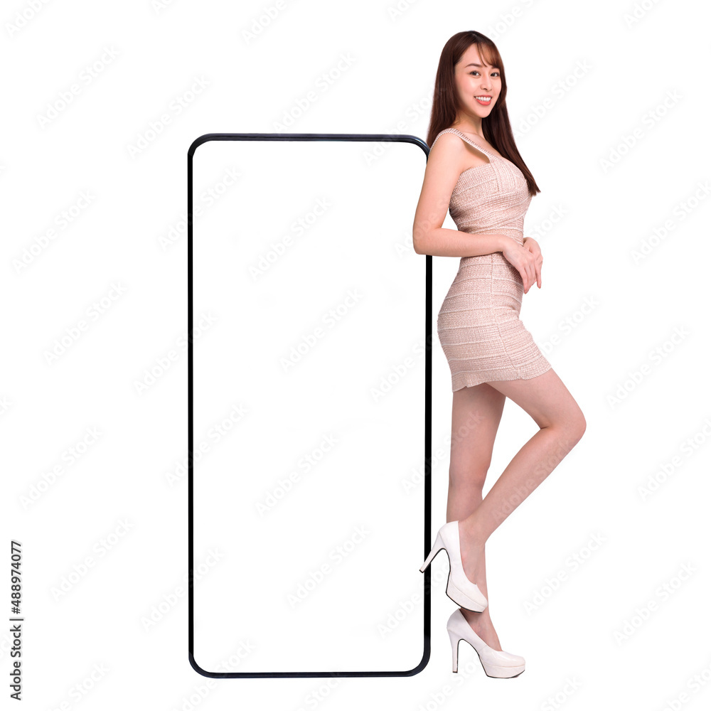 Beautiful young woman standing and Leaning big Smartphone With Blank White Screen Beautiful young woman standing and Leaning big Smartphone With Blank White Screen