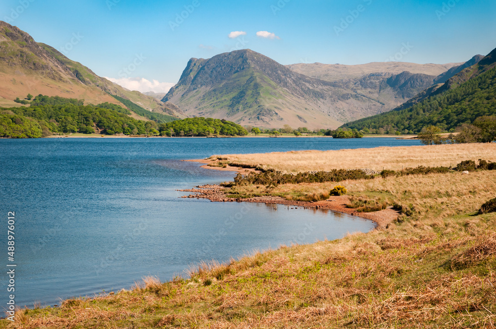 View over Crummock Water in the English Lake District with Fleetwith Pike in the background.