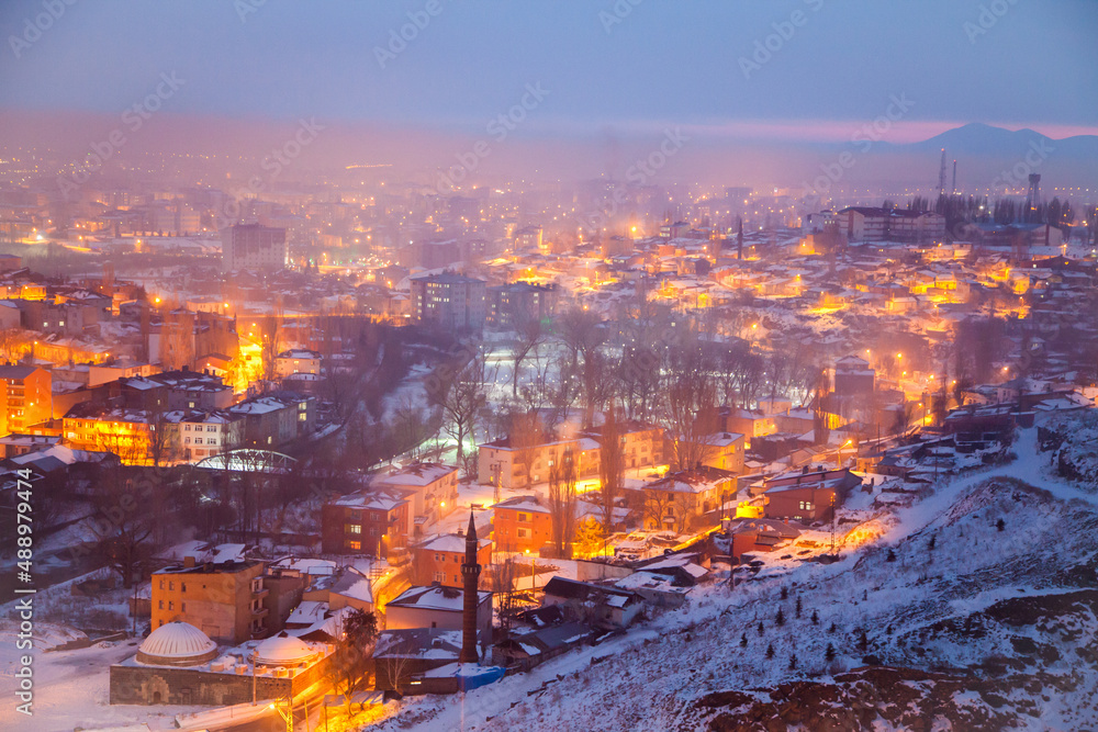 Kars city view and blue sky on a snowy evening