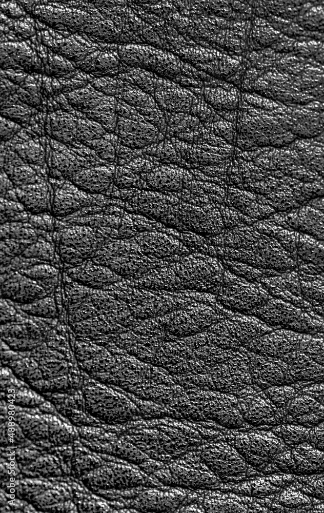 Black leather background, close up