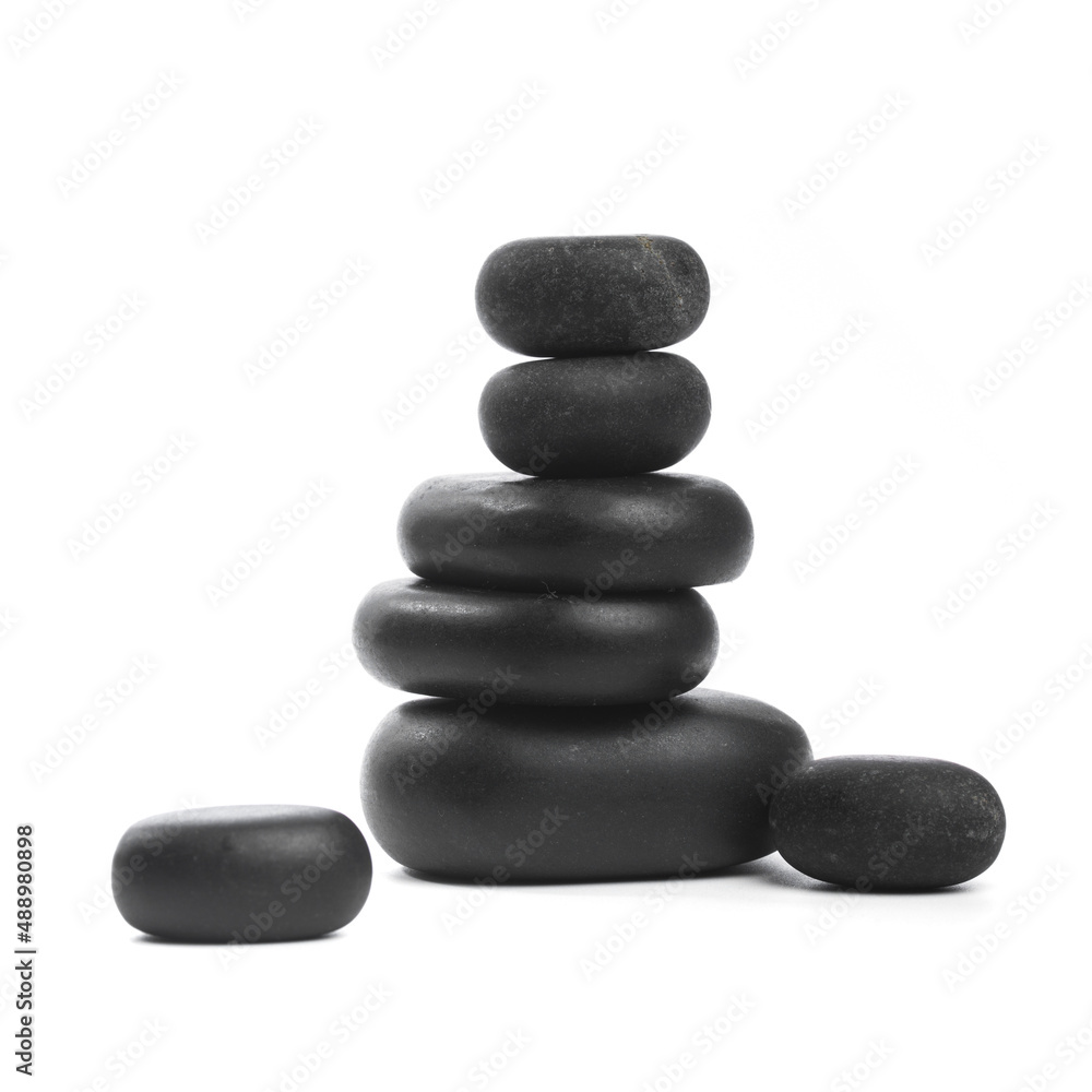black spa stones isolated on white background . black spa stones isolated on white background .