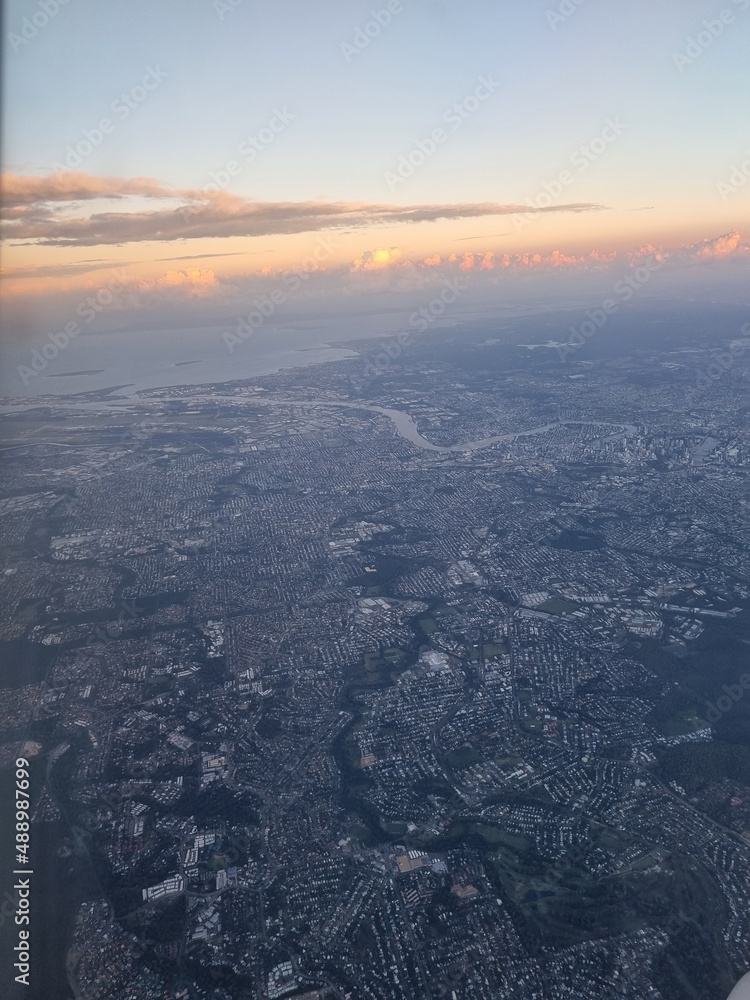 The photos from the airplane in Brisbane Australia during the golden hour