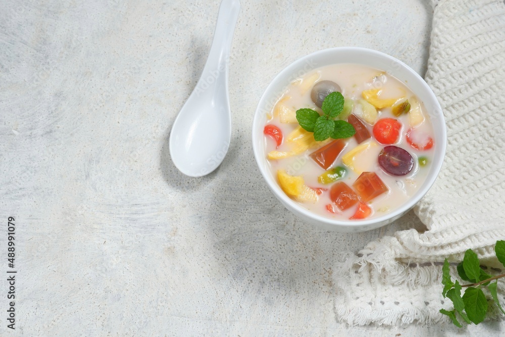 Es buah or sop buah-is an Indonesian iced fruit cocktail dessert. This cold and sweet beverage is made of diced fruits mixed with shaved ice or ice cubes, and sweetened with liquid sugar or syrup. Es buah or sop buah-is an Indonesian iced fruit cocktail dessert. This cold and sweet beverage is made of diced fruits mixed with shaved ice or ice cubes, and sweetened with liquid sugar or syrup.