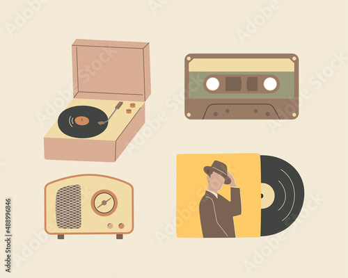 Nostalgia musical equipment, cassette tape and vinyl disc, radio and vinyl record player.