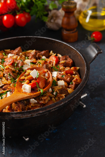 Traditional Greek cuisine. Lamb stew with feta cheese and vegetables.
