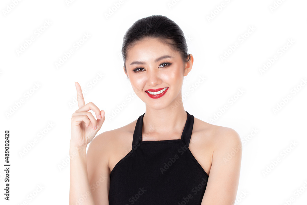 Fashion of a beautiful young asian woman in a pretty black dress and red lips. Fashionable and stylish woman posing isolated on white background. fashion beauty and style. Natural skin makeup. Fashion of a beautiful young asian woman in a pretty black dress and red lips. Fashionable and stylish woman posing isolated on white background. fashion beauty and style. Natural skin makeup.