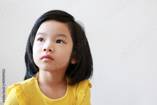 Little asian kid girl portrait on white background