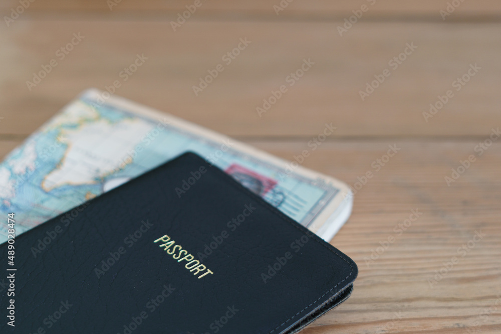 Table top style image of passport and travel notebook. Background holiday or vacation concept image with copy space available Table top style image of passport and travel notebook. Background holiday or vacation concept image with copy space available