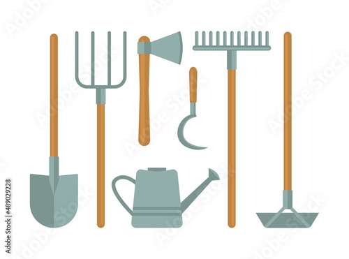 Garden tools set. Shovel, pitchfork, watering can, axe, sickle, rake, hoe.
