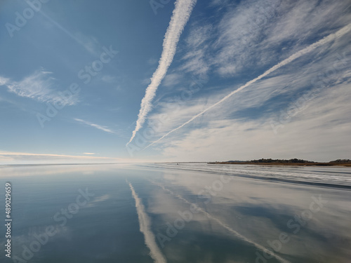 The jet contrails over Bogue Inlet, Emerald island photo