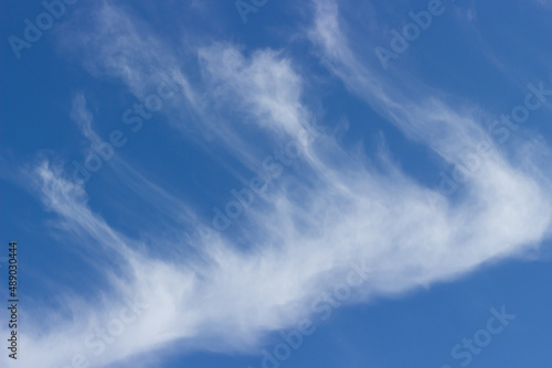 Blue sky with white cirrus cloud. Heaven background