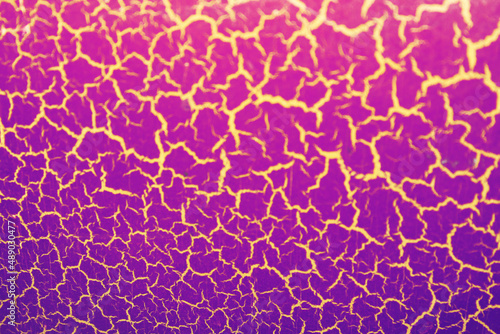 abstract texture purple with golden cracks defocus