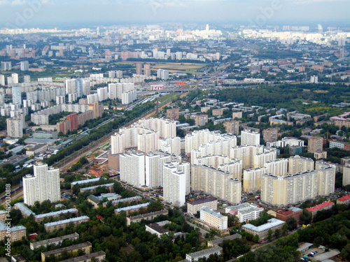 White residential high-rise buildings in Russia. Blured background.