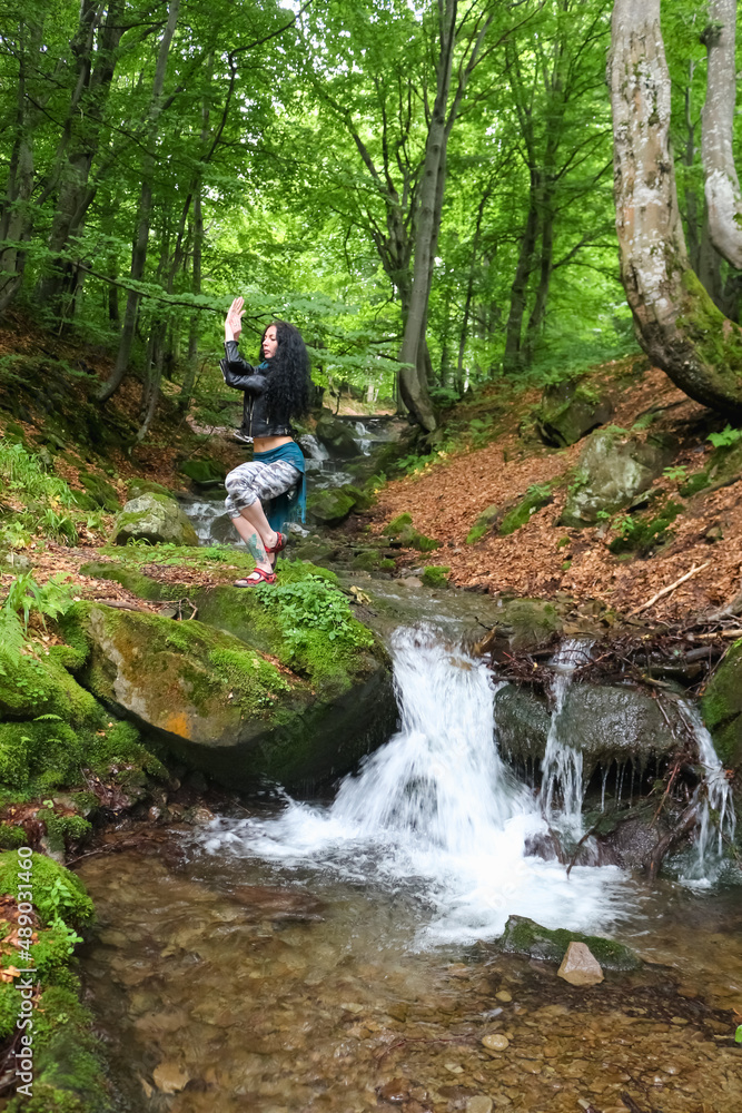 yoga pose in the forest near the stream.. yoga pose in the forest near the stream..