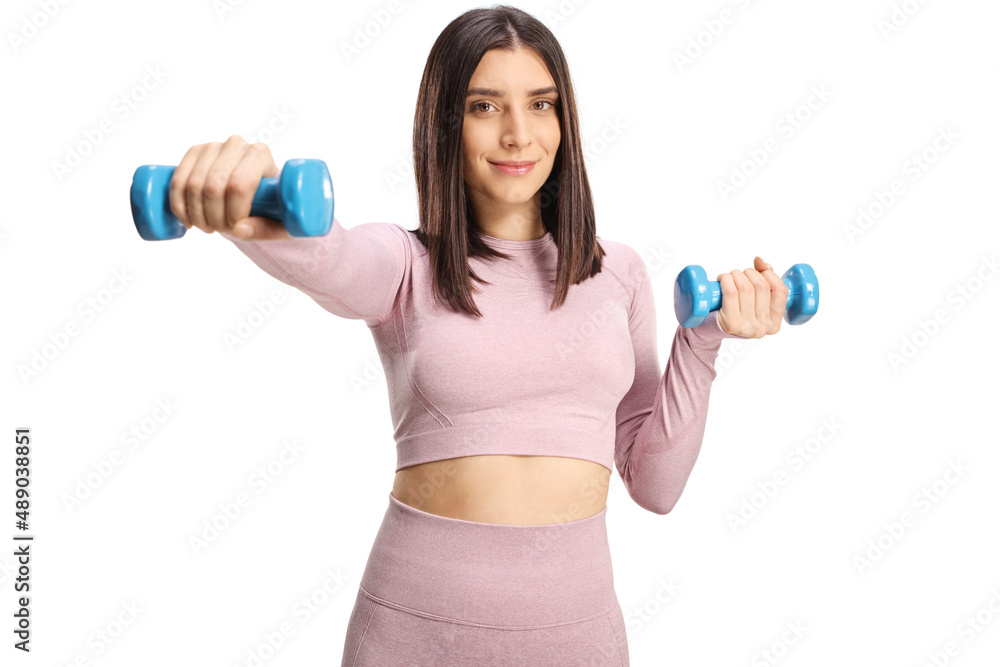 Beautiful young female exercising with dumbbells Beautiful young female exercising with dumbbells