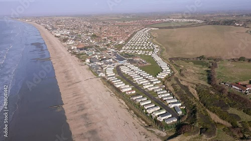 Aerial video along the south coast by Bracklesham Bay and the holiday resort caravan park near East Wittering. photo