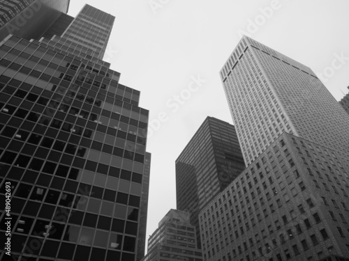 Monochromatic image of a series of high rise buildings in Manhattan.