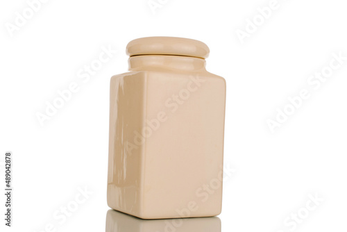 One ceramic food storage jar, macro, isolated on a white background.