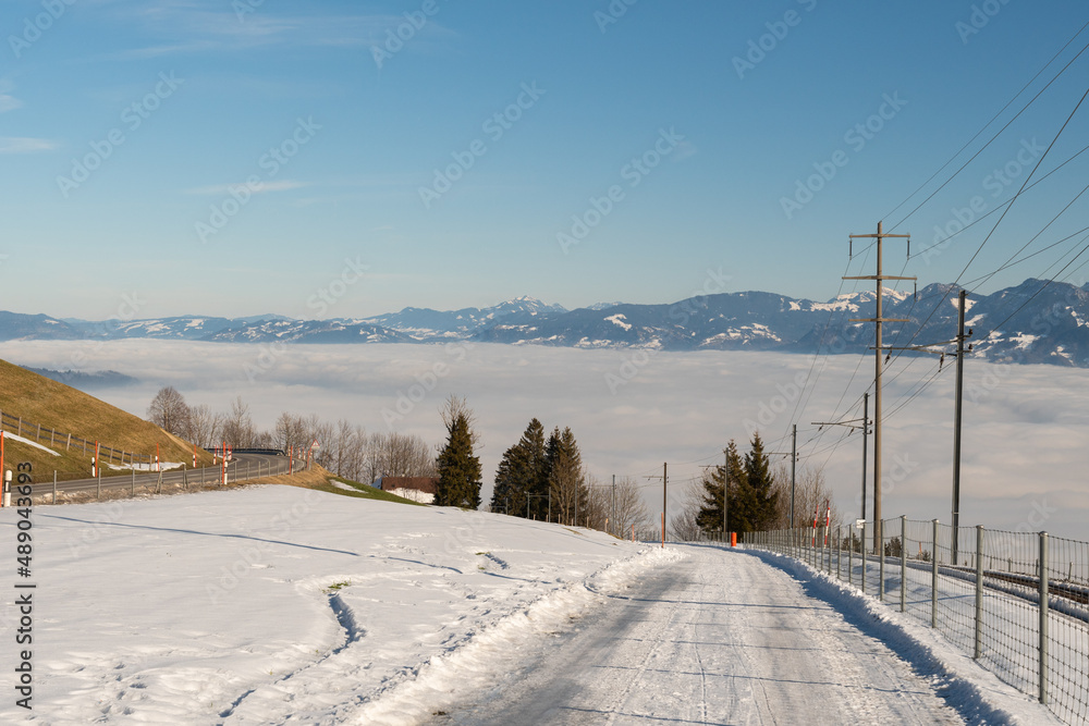 Mist of fog over the swiss and austrian mountains