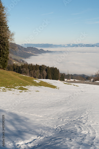 Mist of fog over the swiss and austrian mountains © Robert