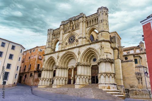 Facade of the medieval cathedral of Cuenca in a cloudy and cold day, Spain.