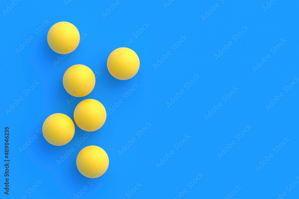Scattered ping-pong balls on blue background. Leisure games. International competitions. Sports Equipment. Table tennis. Flat lay. Copy space. 3d render