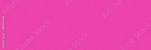Large leather surface dyed in bright pink color. Fashion feminine background. 