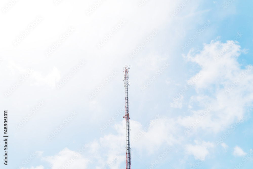 Telecommunication mast TV antennas in the afternoon ,on the hill blue sky with cloud bright at Phuket Thailand. Telecommunication mast TV antennas in the afternoon ,on the hill blue sky with cloud bright at Phuket Thailand.