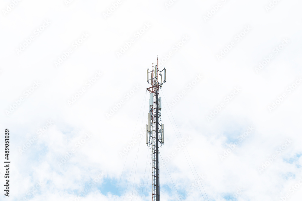 Telecommunication mast TV antennas in the afternoon ,on the hill blue sky with cloud bright at Phuket Thailand. Telecommunication mast TV antennas in the afternoon ,on the hill blue sky with cloud bright at Phuket Thailand.