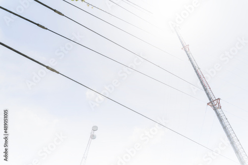 Telecommunication mast TV antennas in the afternoon ,on the hill blue sky with cloud bright at Phuket Thailand.