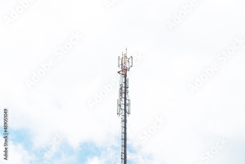 Telecommunication mast TV antennas in the afternoon ,on the hill blue sky with cloud bright at Phuket Thailand.