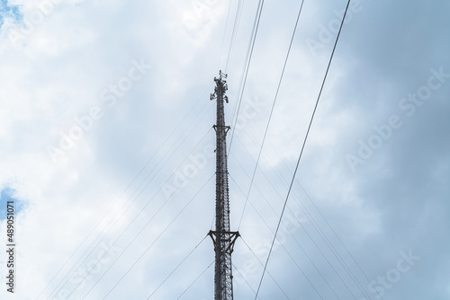 Telecommunication mast TV antennas in the afternoon ,on the hill blue sky with cloud bright at Phuket Thailand.
