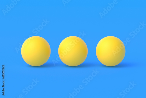 Three ping pong balls on blue background. Leisure games. International competitions. Sports Equipment. Table tennis. 3d render