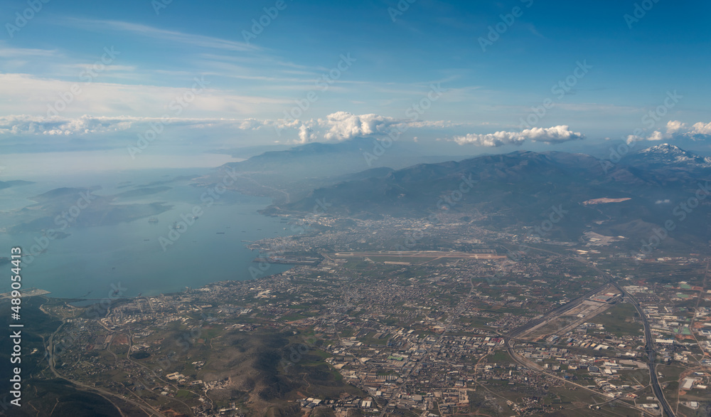 view from the plane window to Greece Athens and the Aegean Sea view from the plane window to Greece Athens and the Aegean Sea