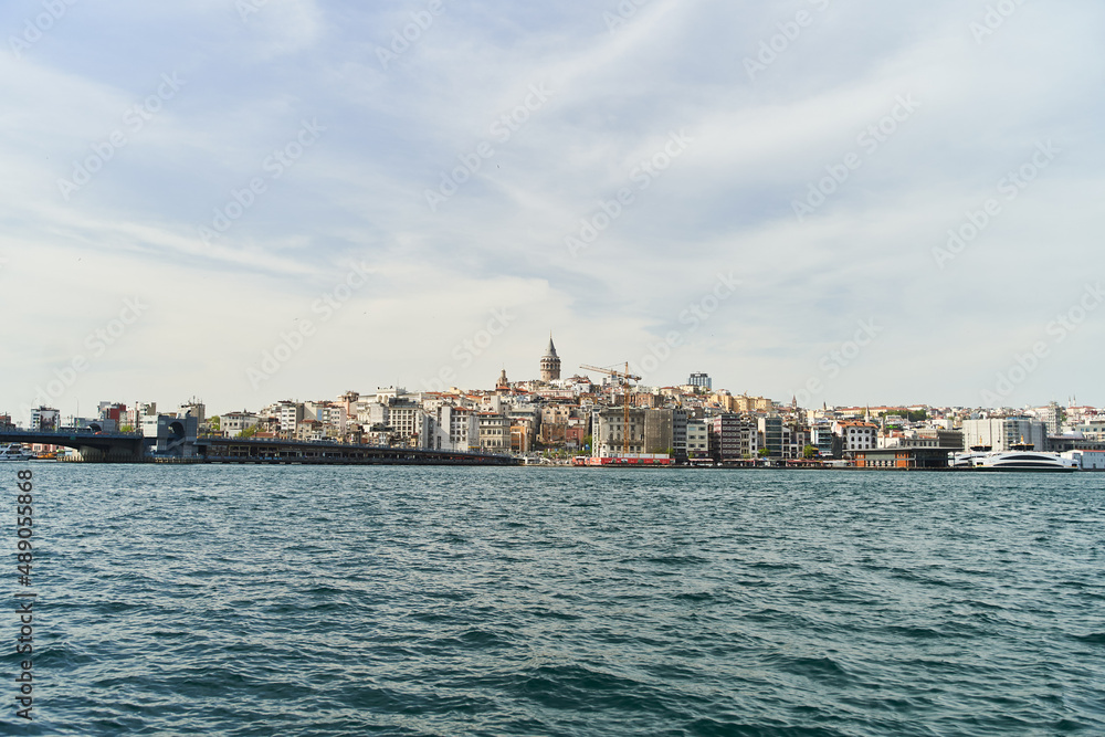 View of the Galata Tower across the Bosphorus Bay from the Fatih area. Istanbul, Turkey. High quality photo