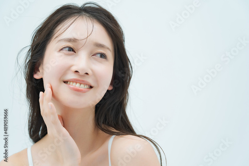 Beauty image of a woman with moist skin