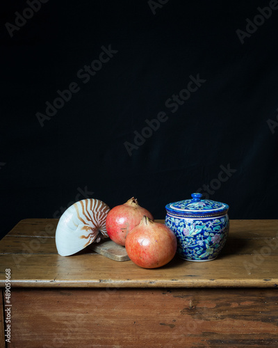 Pomegranate fruits with table