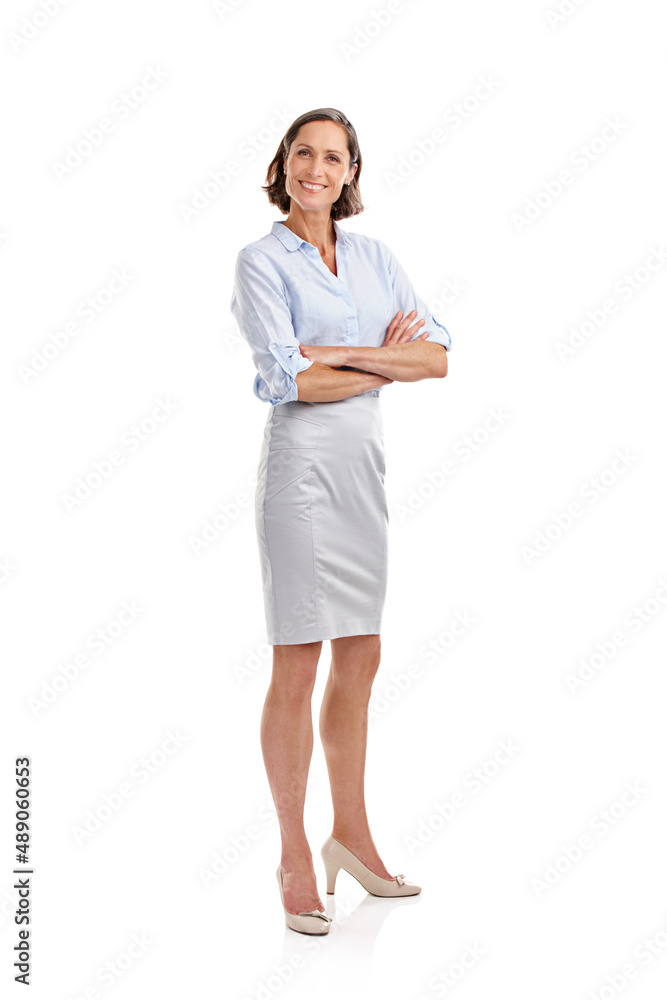 She always dresses fashionably. Full length portrait of a well-dressed mature woman posing in studio. She always dresses fashionably. Full length portrait of a well-dressed mature woman posing in studio.